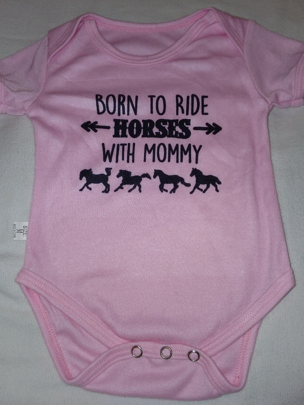 NWOT Pink "Born to Ride Horses With Mommy" Baby One-Piece.